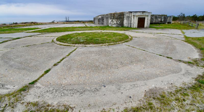 While other bunkers had guns positioned inside with their barrels pointing outside toward the ocean or bay, Battery Herring’s two 6-inch guns were placed outside the bunker.