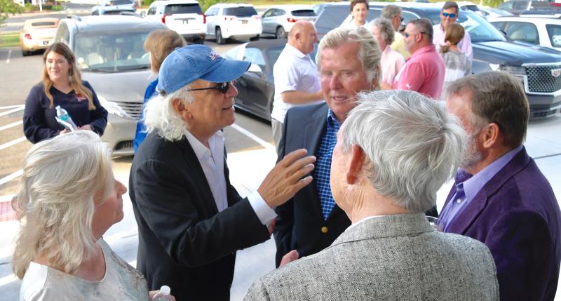 Community Bank Delaware CEO Alex Pires, center, welcomes guests to the open house at the new Rehoboth branch. RON MACARTHUR PHOTOS
