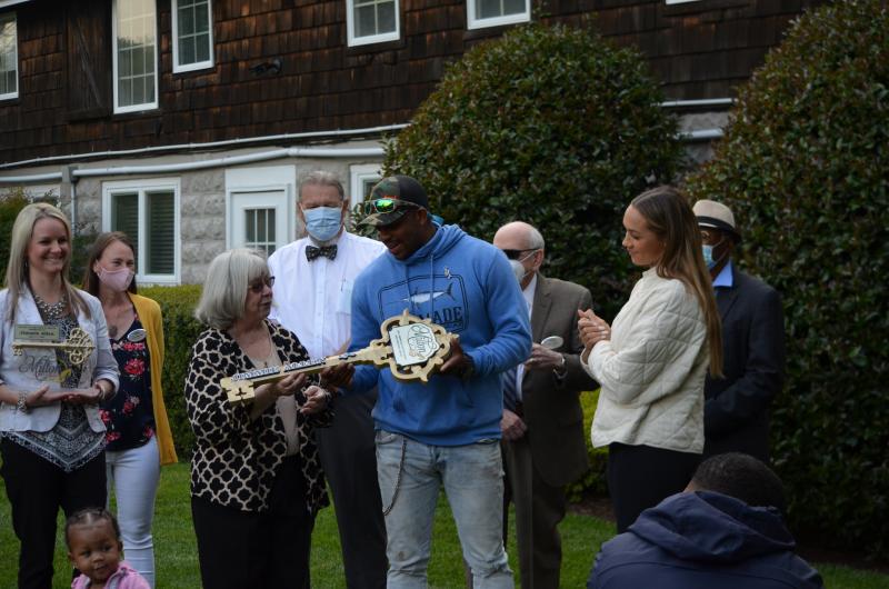 Milton native and country music star Jimmie Allen was given a key to the town May 11. Taking part in the presentation are (l-r) Town Manager Kristy Rogers, Councilwoman Randi Meredith, Councilwoman Lee Revis-Plank, Councilman John Collier, Allen, Councilman Sam Garde, Councilman Larry Savage, Alexis Allen and their daughter, Naomi.