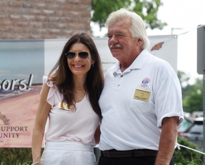Nicole Pickles, executive director of Cancer Support Community Delaware, receives a $3,000 check from Elks Lodge 2540 President Sam Lesher. The Elks sold 138 butterflies this year, a new record.