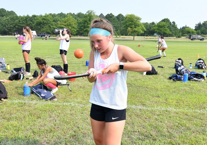 A rising sophomore at Cape Henlopen High School, Mallory Stevenson works on her ball-control air dribble.
