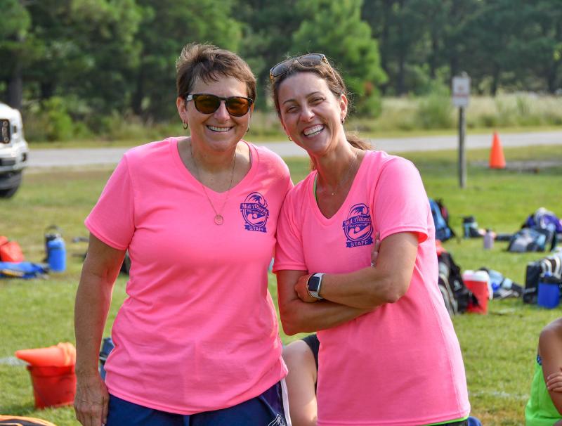 Camp owner Frannie Slabonik, left, and assistant director Melissa Moritsch share a moment before the Wednesday activities.