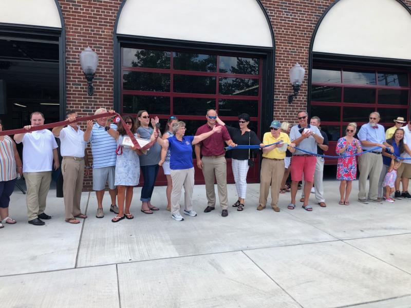 The Milton Fire Department held a July 17 open house to publicly show off its newly renovated station on Front Street. Instead of a ribbon-cutting, the department held a hose uncoupling, with Ladies Auxiliary President Mary Ann Warrington and Milton Fire Department President Brian Reynolds Jr. doing the honors, surrounded by members of the public, and state and local elected officials. RYAN MAVITY PHOTOS