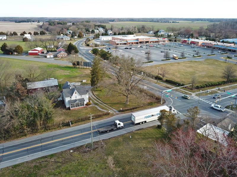 Milton Planning and Zoning Commission reviewed concept plans for a proposed Royal Farms gas station and convenience store July 20. The commission’s main issue with the early draft plans is location of the proposed entrance and exit to the property off Cedar Creek Road, shown at upper left in photo. FILE PHOTO
