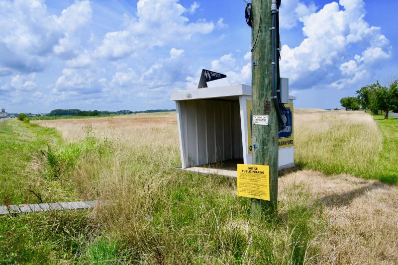 A Sussex County public hearing sign is at the corner of Route 54 and Bennett Avenue near Fenwick Island, the site of a proposed hotel and restaurant on a 9-acre parcel. The county planning and zoning commission has recommended denial of a conditional-use application for the project. RON MACARTHUR PHOTOS