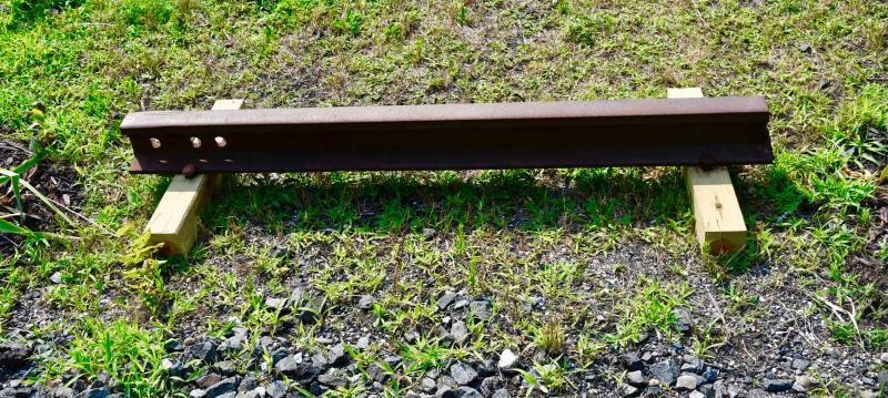 One of the few remaining railroad ties from the Delaware Coast Line in Lewes is on display in the Arvidsons’ garden.