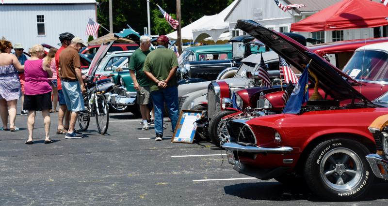 A large crowd checks out the variety of cars on display in the Trinity Faith Christian Center parking lot off New Road in Lewes.