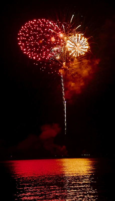 Delaware Bay reflects the lights from fireworks fired off a barge during the Go Fourth Lewes celebration. RON MACARTHUR PHOTO