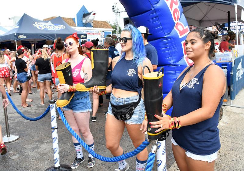 Taking Rehoboth Beach Volunteer Fire Company donations at the event gate are members (l-r) Miranda Harper, Lindsey Gordy and Mali Belcamino. DAN COOK PHOTO