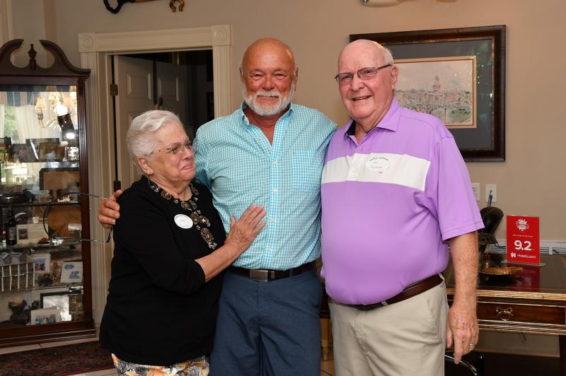 Ed Lester, center, shares a fun moment with friends Joann, left, and Joe Conaway, retired Sussex County administrator.