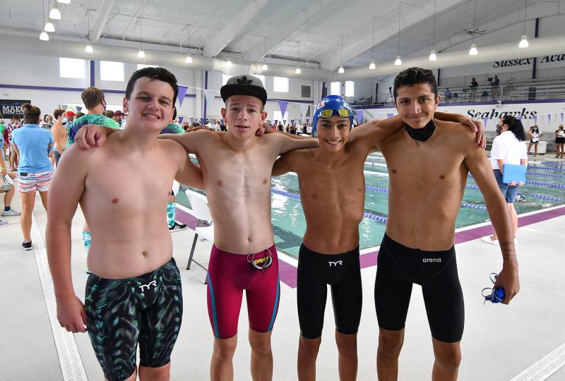 Winning the 200 free relay for the Mako team are (l-r) Brady May, Jaxon Laux, Jude Damouni and Christian Wright.