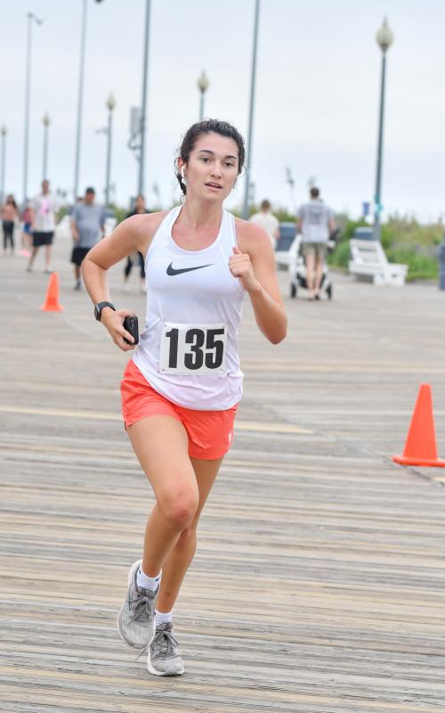 Alexa Dougherty finishes second in the women’s 5K.