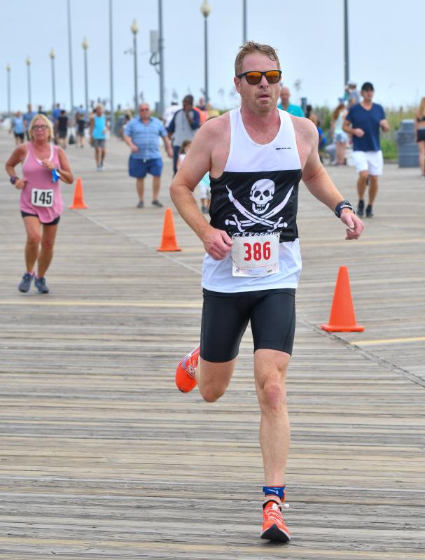 Jon Tower finishes second in the biathlon and wins the masters title.