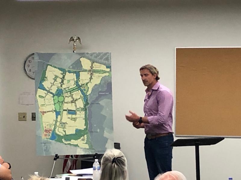 Convergence Communities founder Colby Cox discusses plans for The Granary at Draper Farm, a proposed 1,350-unit subdivision on a 400-plus-acre parcel that the town is considering for annexation. The Milton Special Review Committee held its first meeting on the annexation request July 30, with its next meeting set for Thursday, Aug. 12. RYAN MAVITY PHOTO