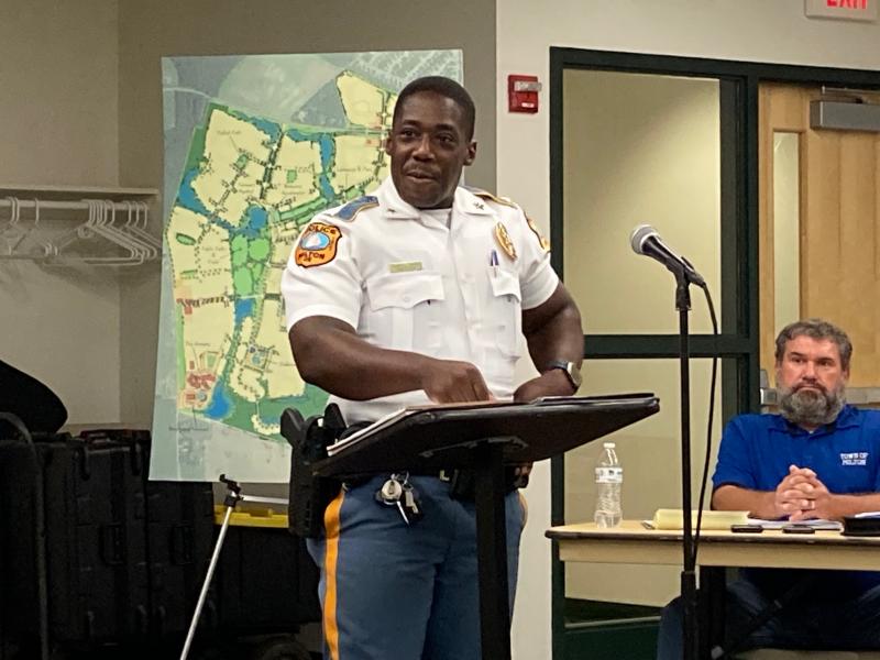 Milton Police Chief Derrick Harvey testifies before the Milton Special Review Committee Aug. 25 about public safety in the proposed Granary at Draper Farms development. The committee is formulating a report on whether to allow developer Convergence Communities to annex 400-plus acres into town. Harvey said his department would need six new officers over the 20-year build-out of the Granary. RYAN MAVITY PHOTO
