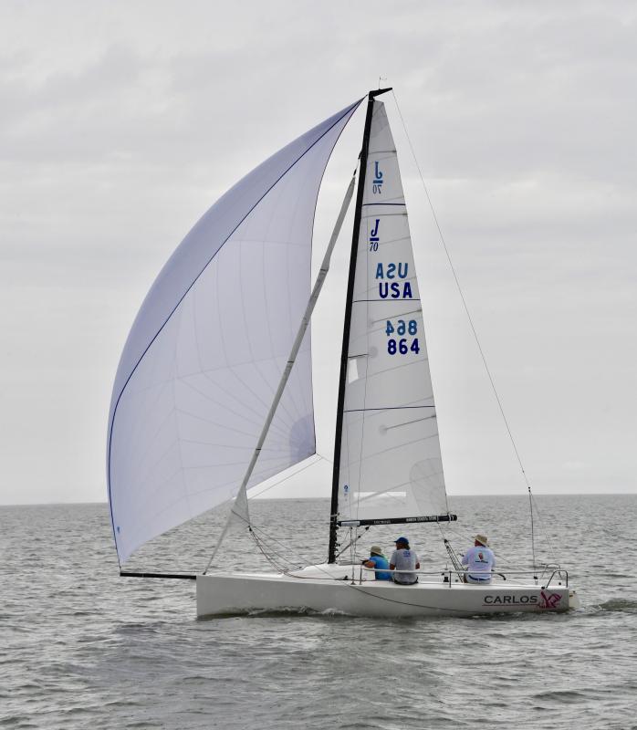 Carlos, skippered by Tom Lord of Corinthian Yacht Club of Cape May, N.J., one of the race founders, crosses the finish line in first place for the racer cruiser class. He and his crew also won the Cape-to-Cape Cup as the overall winner for both days of racing.