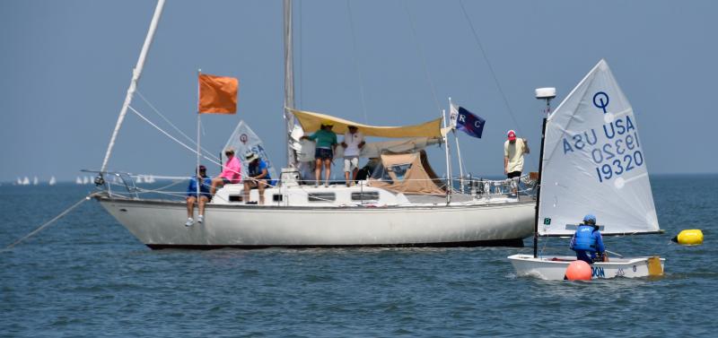 Robert Herzog, Severn Sailing Association, is the top Optimist sailor in the fleet, winning the blue class and finishing first overall.