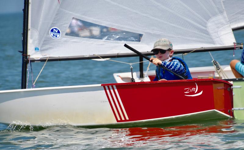 Daniel Skutch Tyson, Severn Sailing Association, sails to a first-place finish in Optimist white competition. He was also second overall among Optimist sailors.