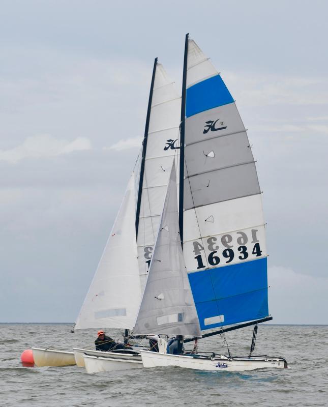 Skippers Bill Colgan (16934) and George Kuney (17013) had four close races, with Colgan taking first place in the Hobie 18 class.