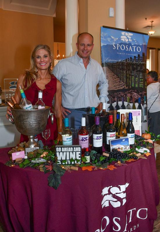 Business partners Karen Howard Sposato and Tony Sposato of Sposato Wines serve up a variety of their wines at the event.
