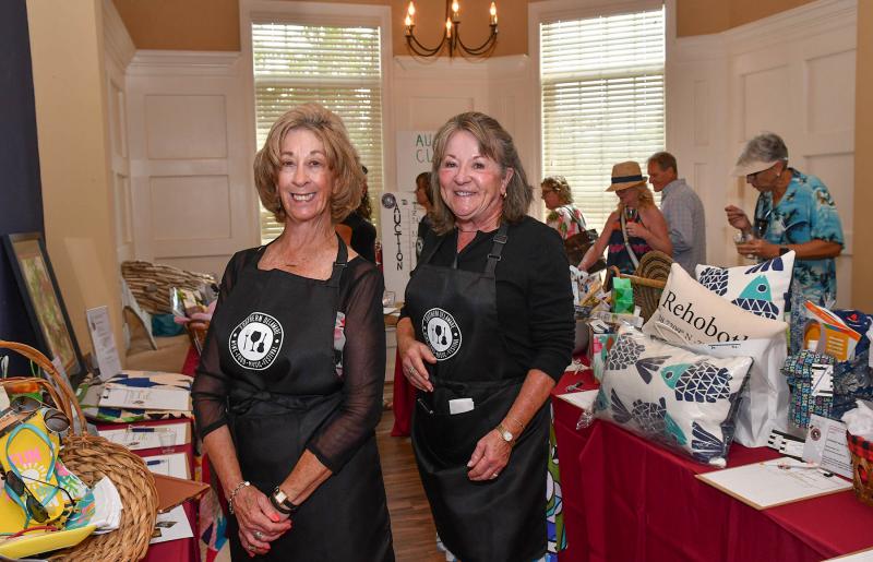 Silent auction Chair Judy Rayner, left, and Francie Crosby are proud of their efforts to raise funds during the event.