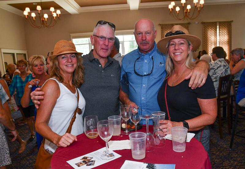 Having a great time are locals (l-r) Karen and Tom Seibel, and David and Deb Cumberland.