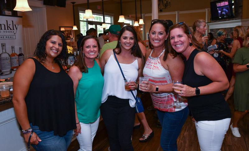 Locals enjoying the Frankly Organic Vodka bar are (l-r) Sally Ghabour, Melissa Hitchens, Kimberly Makowski, Laura Balback and Geri Dickerson.