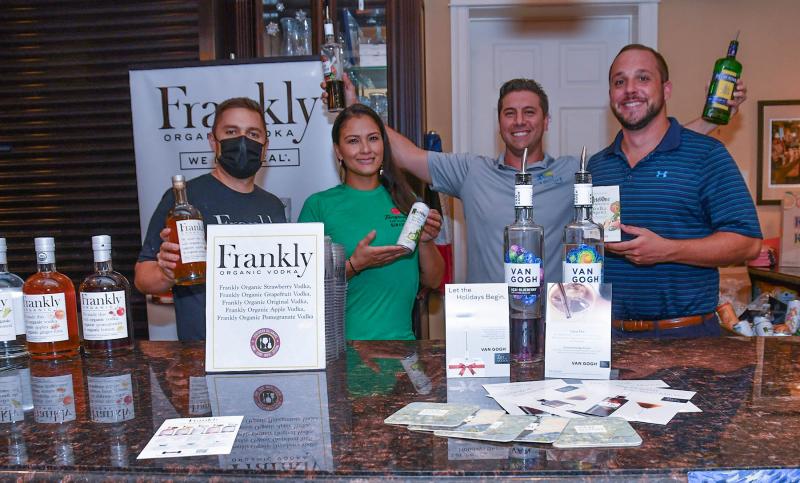 Taking care of the Frankly Organic Vodka and Van Gogh are (l-r) Corey Galotta, Justin Kotlowski, Elizabeth Cardona and Nick Boody.