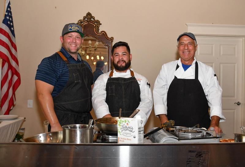 The Surf side of the Surf and Turf Chef Throwdown includes (l-r) Frank Dubinski of Plate and Palette, Osvaldo Ayala of Lefty’s Alley & Eats, and Franco Brattoli of Two Meatballs.