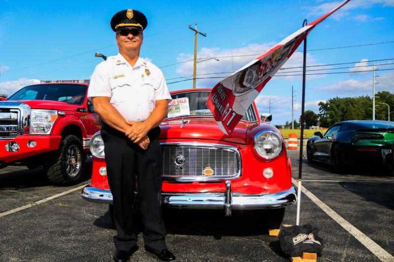 John Kisser, a retired firefighter from Baltimore, Md., poses with his ‘65 Rambler that he purchased after his retirement.