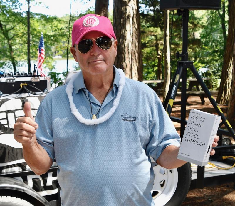 Frank Hunter of Ocean View is a winner of one of the many games and dance contests taking place during the CHEER picnic.