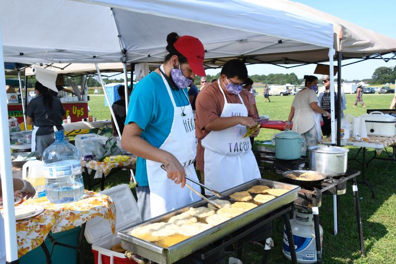 By far, the most popular powwow food is flatbreads prepared at many food booths, including Hill Taco.