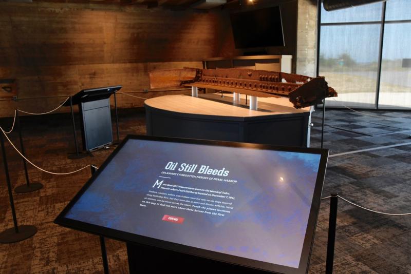 The exhibit features interactive screens allowing visitors to learn the exact locations and stories of more than 20 Delawareans serving in the military at Pearl Harbor on the day of the attack.