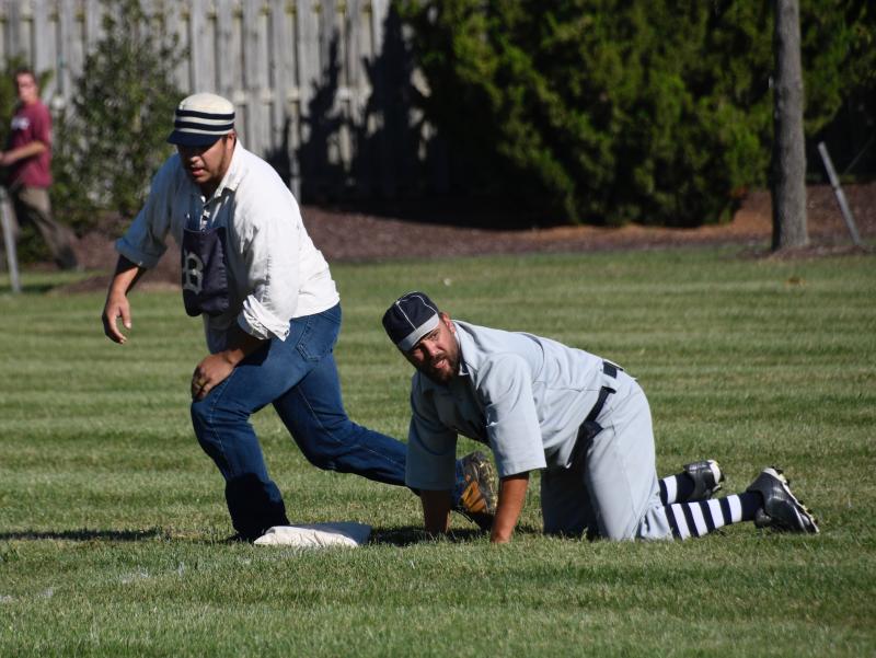 Lewes’ Pat “Bullfrog” Zmuda slides into third ahead of the throw as Brandywine’s Dawson “Dirt” Guzik watches for the ball.