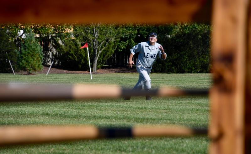 Lewes third baseman Warren “Yankee” Miller tracks down a ball during his team’s first festival game. Lewes won both of its games.