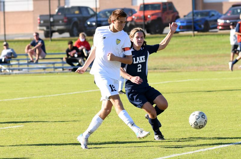 Niko Panyko takes a shot past Lake’s Case Dempsey.