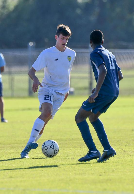 Cape’s Tiarnan Hefferan puts a move around Lake’s Coen Dempsey.