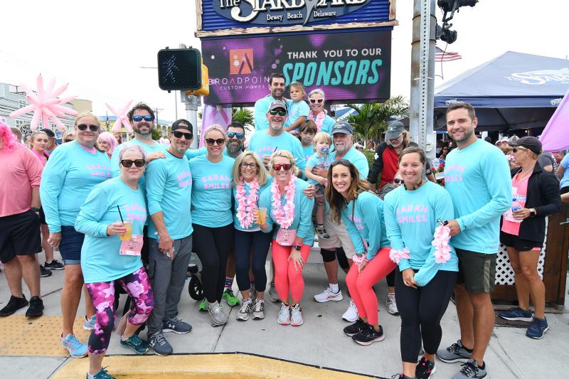 The Sarah Smiles group are in back (l-r) Mary Preston Brown, Mike Zygmonski, Andrew Dickinson, John Karpowicz, Mike Dickinson, Olivia Dickinson, Kate Dickinson and George Dickinson. In front are Susan Karpowicz, Chris Parziale, Lindsey Barry, Linda Dickinson, Sarah Dickinson, Fin Dickinson, Gary Dickinson, Lindsay McBride, Caroline Judge and Ben Ross. The Sarah Smiles team raised $12,231.25. Sarah Dickinson was declared cancer-free after four surgeries.
