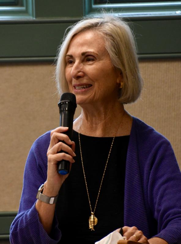 Susan Del Pesco, one of three committee members, introduces relatives of Margaret White Houston at the start of the ceremony at the Georgetown library.