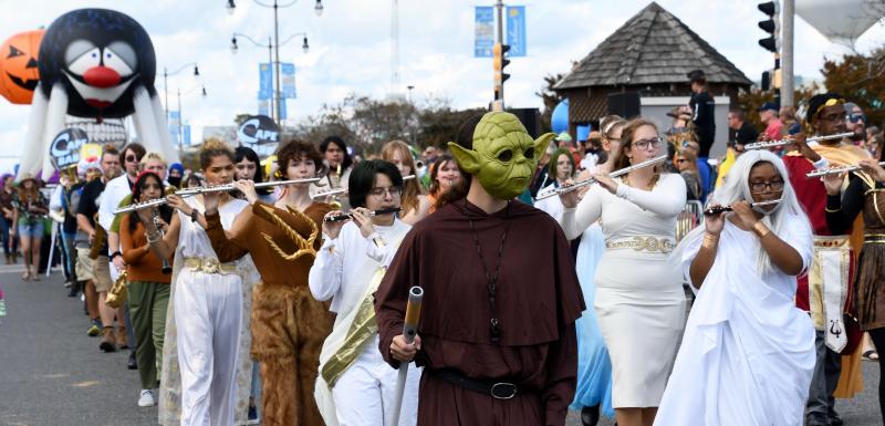 The Cape Henlopen High School Marching Band is dressed for the occasion, including Yoda leading the way.