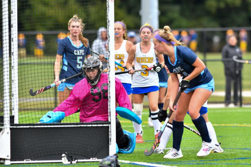 Mack Brown scores one her her three goals.