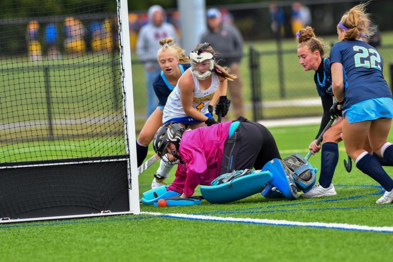 Sam Connors pokes home a goal.