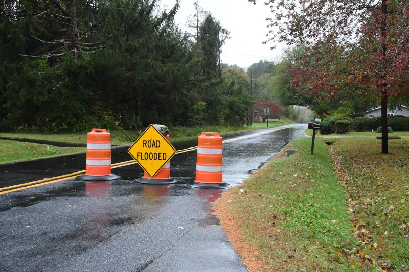 These barriers are designed to stop people from driving down Front Street in Milton. Unfortunately, most people drive around them. NICK ROTH PHOTO