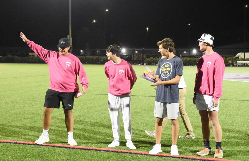 Kenny Cay, far left, reacts to being named Homecoming king. Also vying for the title were Jayson Kirschner of Lewes, Logan Podraski of Lewes and Jackson Basile of Lewes. Ty Hudson of Lewes is not pictured.