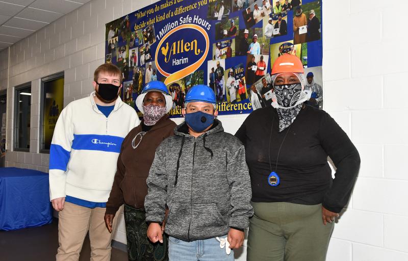 Three winners were notified on the morning shift by Corporate Safety Manager Ian Toomey. Shown are (l-r) Toomey, Marie Dorcent, Guillermo Briseno and Sheronda Jones Fosque. Not shown are winners Joel Rivera Larmona, Oziel Rodriguez, Curt Purse, James Morestime, Gregory Stevenson, Jose Martinez-Ortiz, Michael Murphy and Wilmary Cortes Pabon. DAN COOK PHOTOS