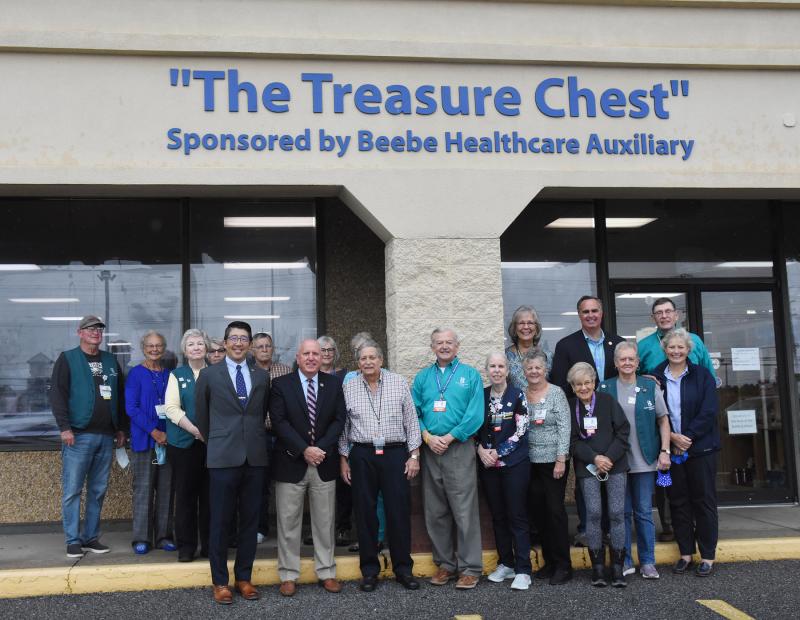 Celebrating Beebe Auxiliary’s 85th anniversary are in back (l-r) Bill Hyatt, Rosey Vanderhoogt, Nancy Almacy, Mary Ann Sterling, John Spera, Nancy Tartaglione, Karen Palmer, Karen Caulk, Sen. Ernie Lopez, R-Lewes, and Mike Clemmer. In front are Beebe Healthcare President and CEO Dr. David Tam, Beebe Medical Foundation President Tom Protack, Treasure Chest Manager Bob Anzilotti, Beebe Auxiliary President Wendell Alfred, Linda Rolla, Sue Kleva, Nancy Palladino, Ruth Patterson and Kay Young, Beebe Medical Foundation executive director of development. NICK ROTH PHOTOS