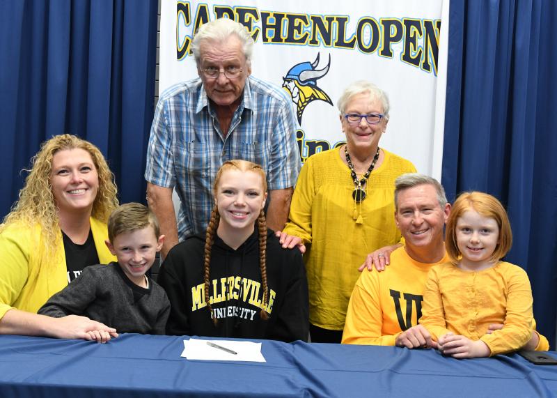 Morgan Mahoney with grandparents Jim and Rosemary Wehr, in back, and mother Kelly Hynes, brother Noah Haynes, stepdad James Haynes, and sister Molly Claire Haynes. Morgan is heading to Millersville University to play basketball for the Marauders of coach Sharey Hall. Millersville plays in the PSAC conference.