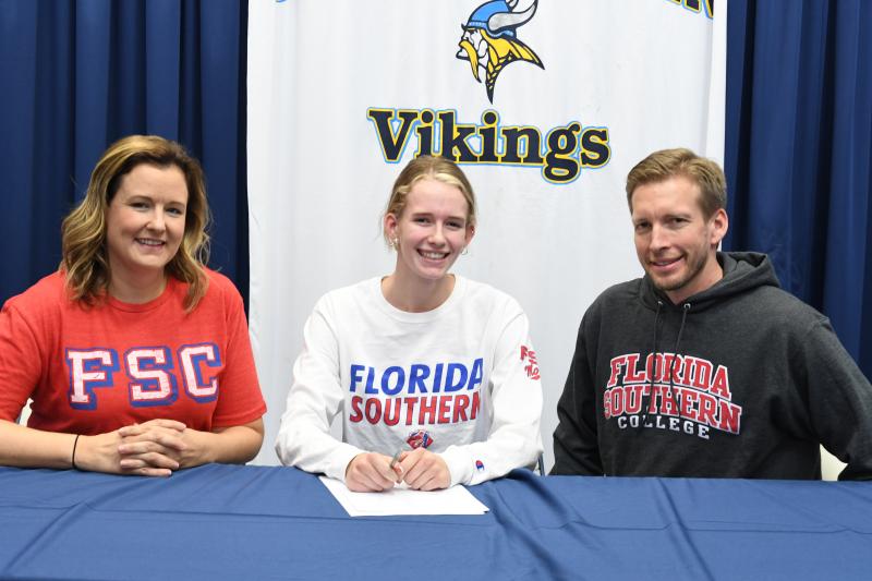 Rileigh Wilson with parents Jill and Chris Wilson. Rileigh will be attending Florida Southern College in Lakeland, Fla. The Moccasins of coach Chris Keen are a Division II program that plays in the Sunshine State Conference.