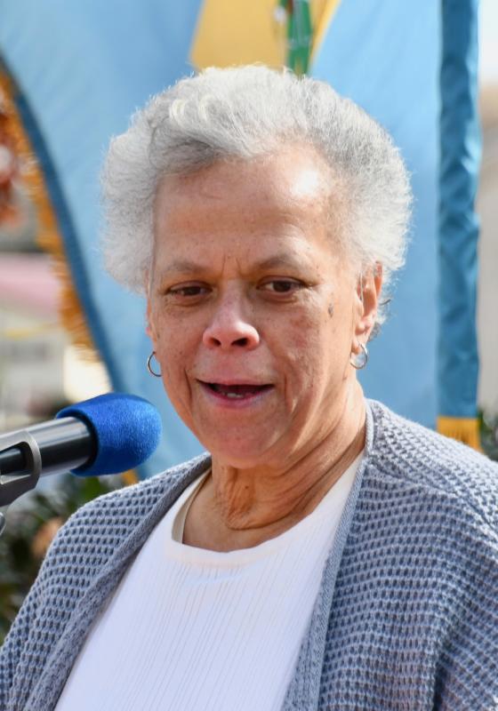 Leolga Wright reads a history of the Indian Mission School, which operated from 1921 through the 1961-62 school year.