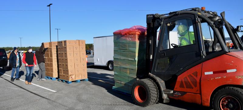 Keeping volunteers supplied with meal boxes is a constant job at the Crossroad Community Church distribution site.